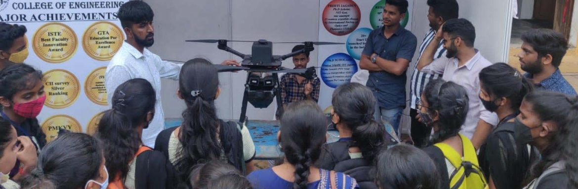 Don Bosco College Of Engineering student demonstrating the drone used for remote coconut spraying